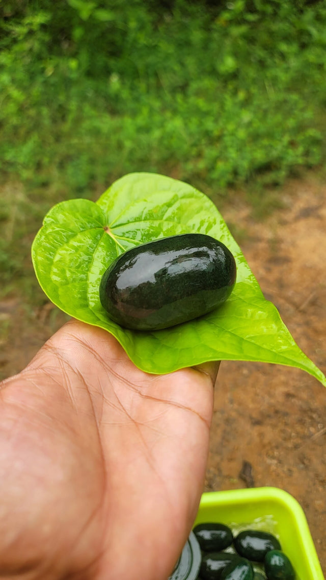 Green oval linga stone ( Emerald)
